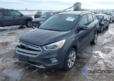 2019 Ford Escape Titanium z USA, uszkodzony, nr VIN 1FMCU9J91KUB92295